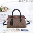 Coach Handbag, a perfect blend of style and practicality 26 x 11 x 17 cm, this handbag offers just the right amount of space for your essentials - 2
