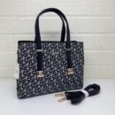 DKNY Handbag, where style meets functionality. With a generous size of 32 cm - 1