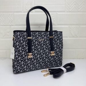DKNY Handbag, where style meets functionality. With a generous size of 32 cm
