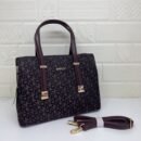 DKNY Handbag, where style meets functionality. With a generous size of 32 cm - 2