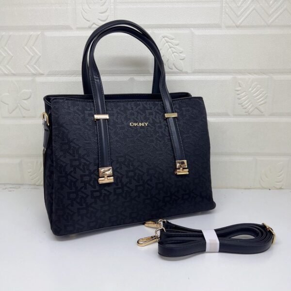 DKNY Handbag, where style meets functionality. With a generous size of 32 cm