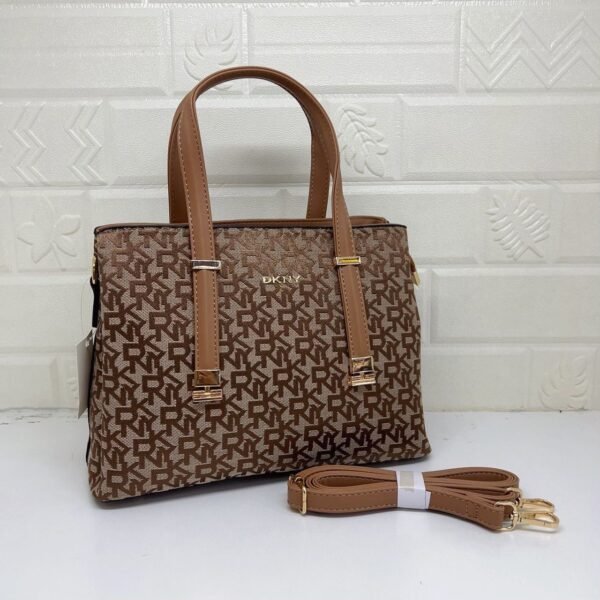 DKNY Handbag, where style meets functionality. With a generous size of 32 cm