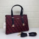 DKNY Handbag, where style meets functionality. With a generous size of 32 cm - 5