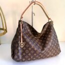 Louis Vuitton Shoulder Bag, a perfect blend of luxury and practicality. Measuring a generous 42 cm, this bag offers ample space for all your essentials - 1