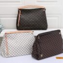 Louis Vuitton Shoulder Bag, a perfect blend of luxury and practicality. Measuring a generous 42 cm, this bag offers ample space for all your essentials