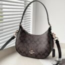 the Coach Kelo Hobo Shoulder Bag, a pinnacle of style and functionality. Crafted with first-quality materials, this bag measures 21 x 18 cm - 3