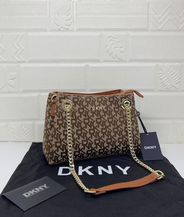 DKNY Sling Bag, a stylish blend of sophistication and practicality 25 x 17 x 10 cm and packaged in its original box
