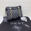 DKNY Shoulder Bag, a perfect blend of style and functionality. With a size of 25 cm, this shoulder bag offers ample space for your essentials while maintaining a sleek - 3