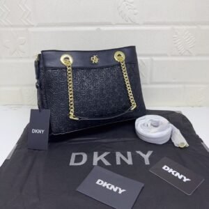 DKNY Shoulder Bag, a perfect blend of style and functionality. With a size of 25 cm, this shoulder bag offers ample space for your essentials while maintaining a sleek
