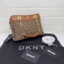 DKNY Shoulder Bag, a perfect blend of style and functionality. With a size of 25 cm, this shoulder bag offers ample space for your essentials while maintaining a sleek - 1