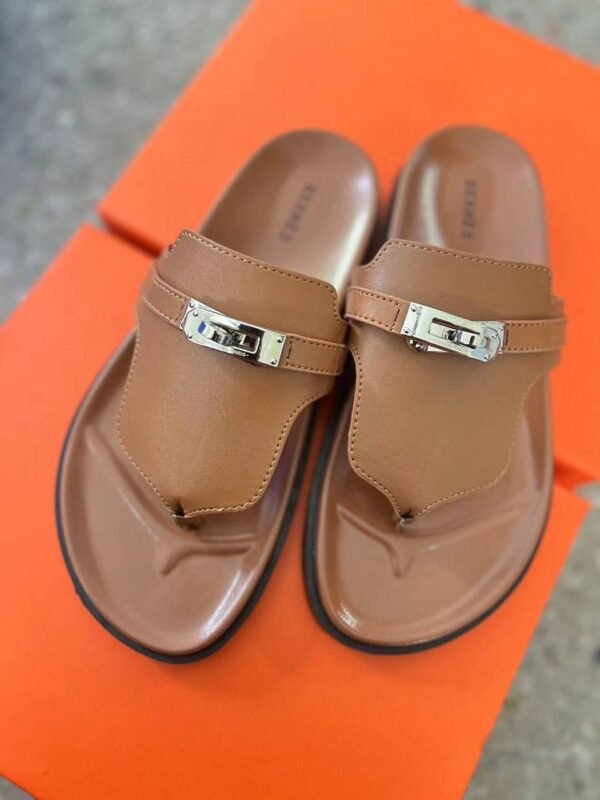 the epitome of luxury and comfort: Hermes slippers. Crafted with impeccable attention to detail and using the finest materials