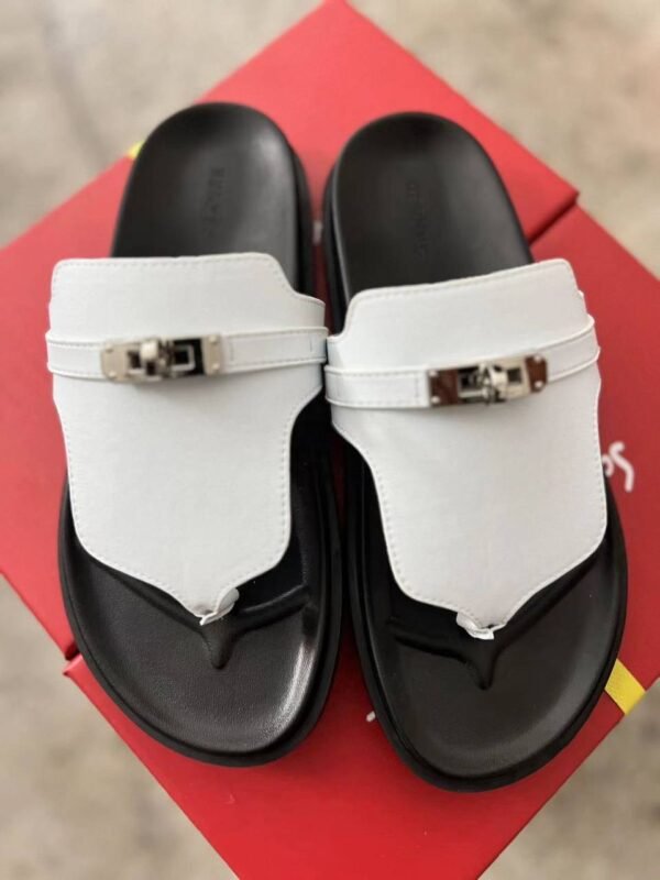 the epitome of luxury and comfort: Hermes slippers. Crafted with impeccable attention to detail and using the finest materials