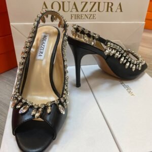 Aquazzura heels, the epitome of Italian luxury and craftsmanship. Each pair is meticulously designed to blend elegance with contemporary style