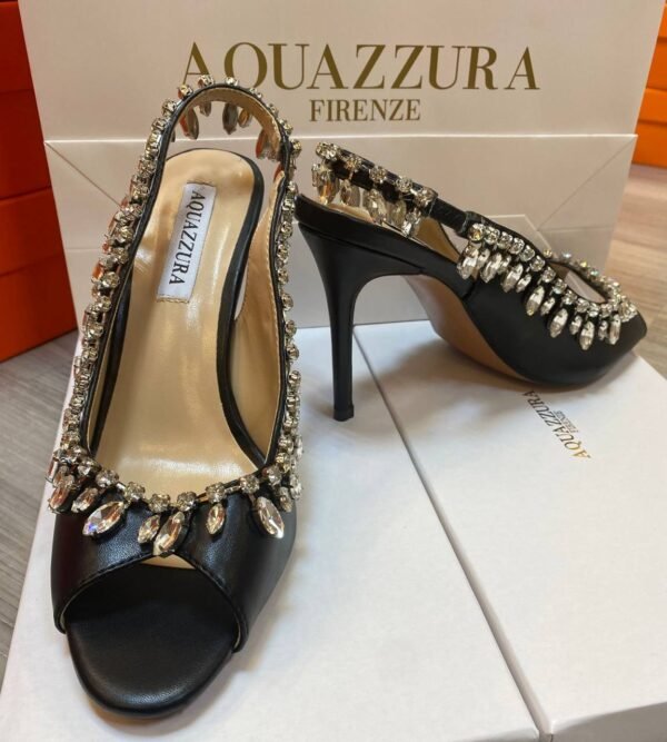 Aquazzura heels, the epitome of Italian luxury and craftsmanship. Each pair is meticulously designed to blend elegance with contemporary style