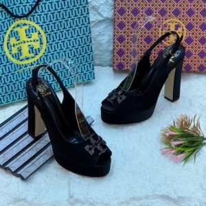 Tory Burch sandals. Crafted with impeccable attention to detail and featuring the iconic Tory Burch logo, these sandals are the epitome of casual elegance