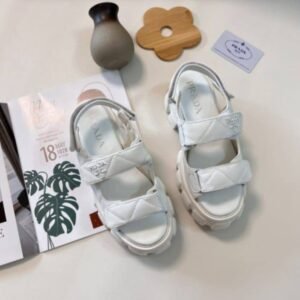 Prada sandals. Crafted with meticulous attention to detail and using the finest materials, these sandals blend contemporary fashion with timeless elegance