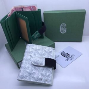 “Unleash a burst of color and style with our Goyard Wallets. Each wallet, complete with its elegant box