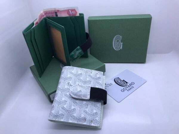 “Unleash a burst of color and style with our Goyard Wallets. Each wallet, complete with its elegant box